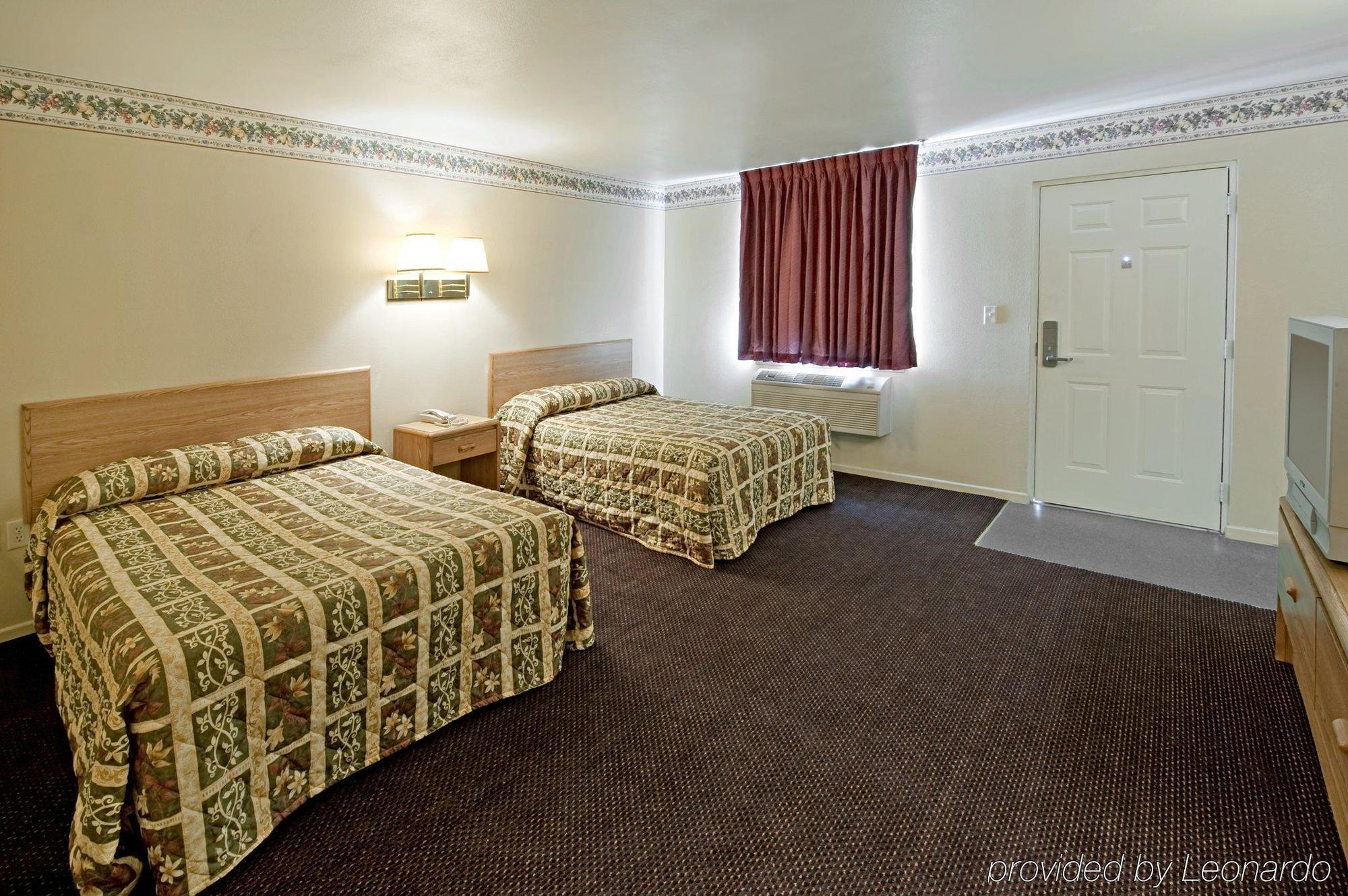 Americas Best Value Inn МакКини Стая снимка